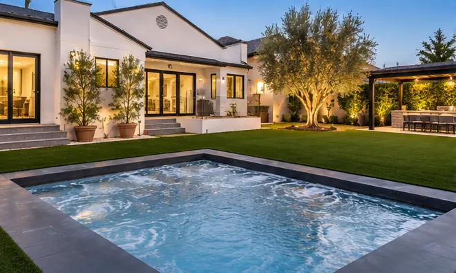 Charcoal — Optima pool with dark charcoal coping and a light interior in Las Vegas